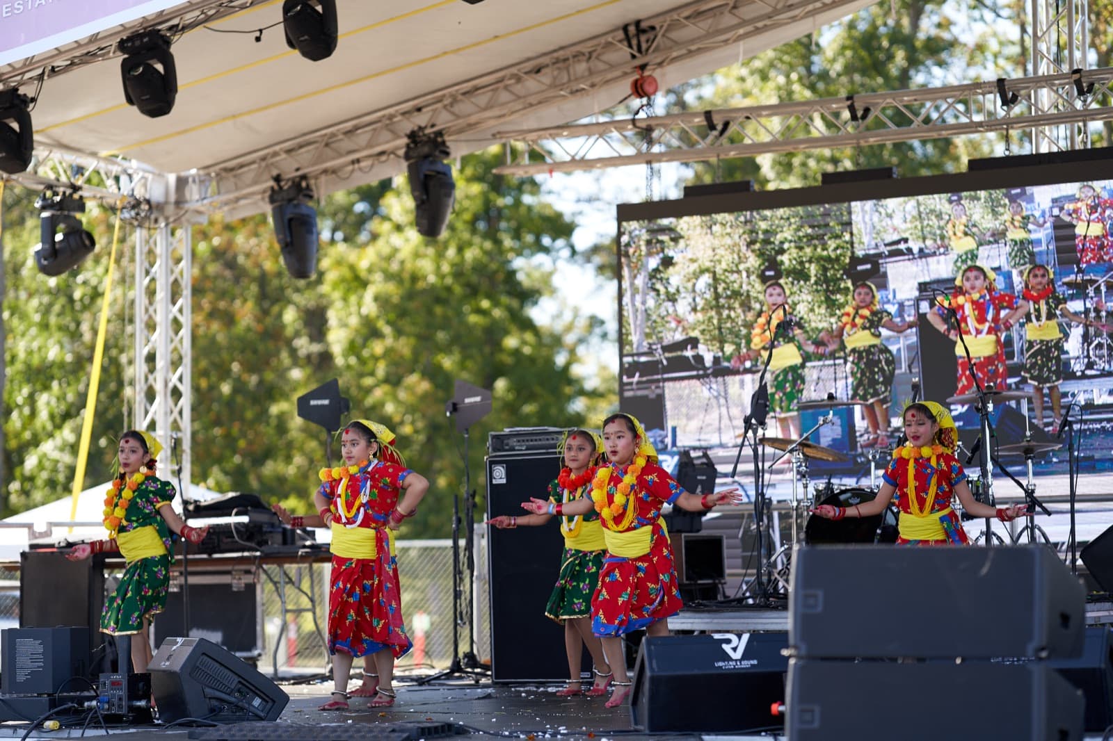 Wide shot of stage with child performers